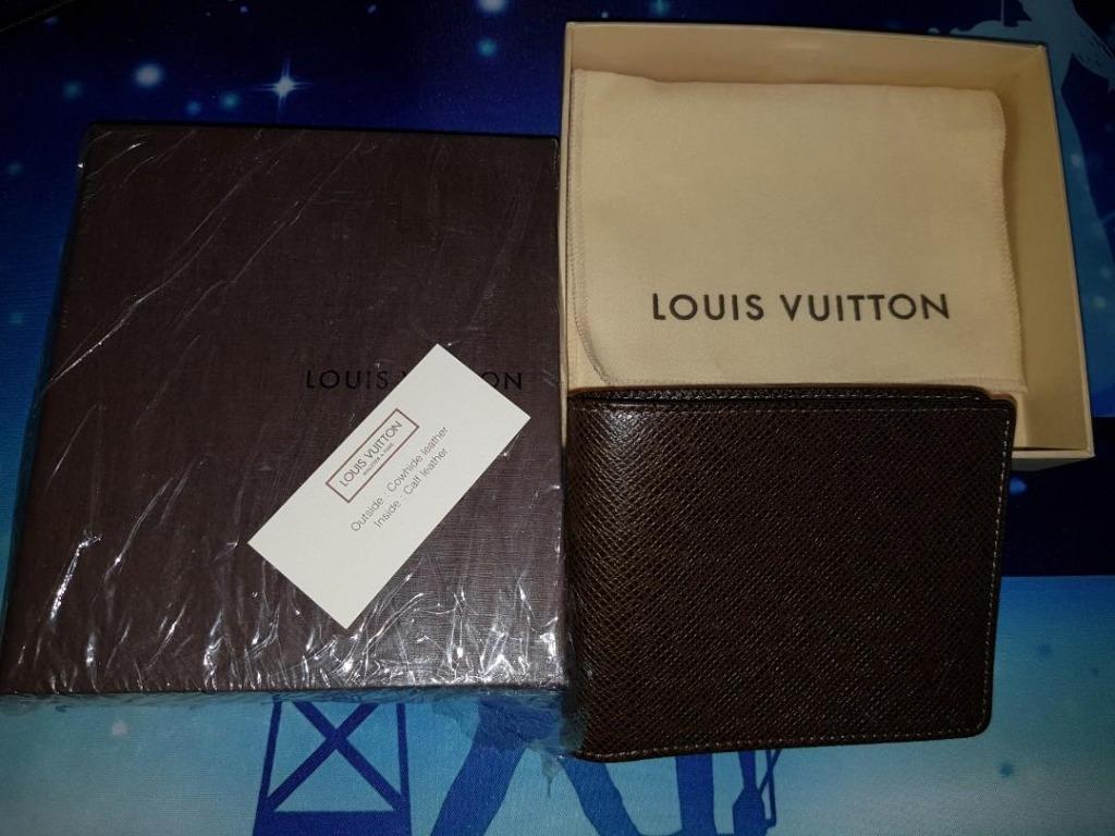 Authentic Louis Vuitton Taiga leather long wallet. 4” x 6.5” when closed.  Excellent condition. [$295] #designerfashion #designerwallet…