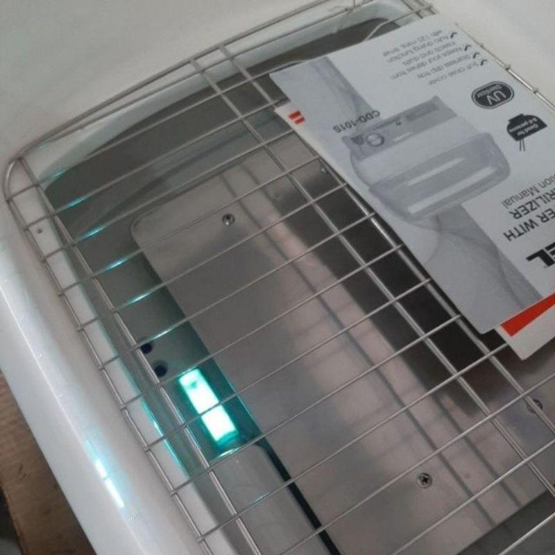 Brandnew Camel Dish Sterilizer (Purple) (Category: Food Organization & Storage) located in San Jose del Monte. Submitted by robertpastor (Listing ID 1064957634, Image 1). Description: ✅Heater Dish Dryer ✅Voltage: 230V AC /60hz ✅Power: 300 Watts ✅Auto Drying Function with 120-minute timer ✅Dust &amp; Insect Free ✅Low Power Consumption ✅Soft Closing Cover ✅Stainless with Drip Tray ✅With UV Sterilizer ✅Product Dimension: 42cm x 31cm x 37cm (L x W x 