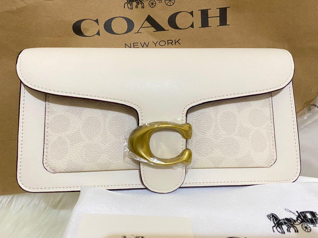 coach tabby signature white Cinosural International School