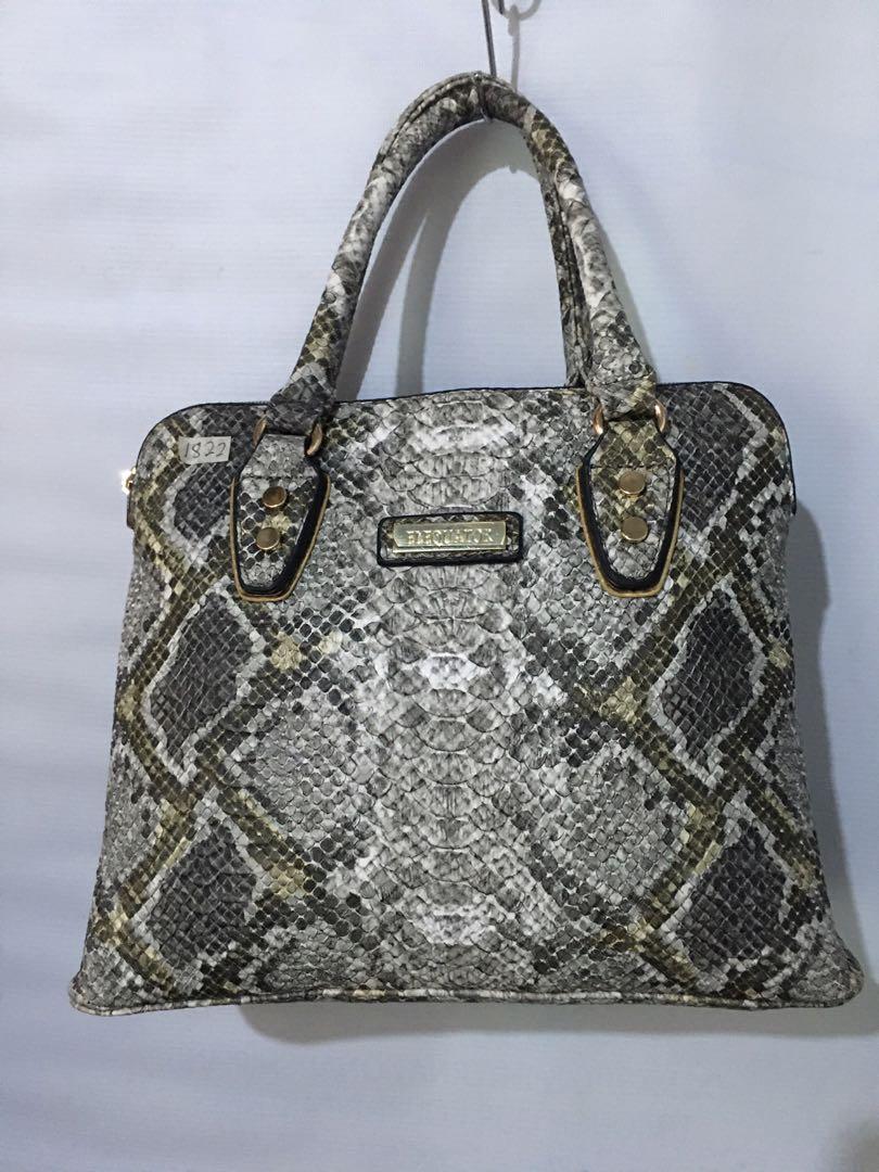 Elequator snake skin two way (Category: Shoulder Bags) located in Cainta. Submitted by janilen (Listing ID 1069824867, Image 1). Description: 10"x12" Authentic. No sling. No flaws See Pic for details .