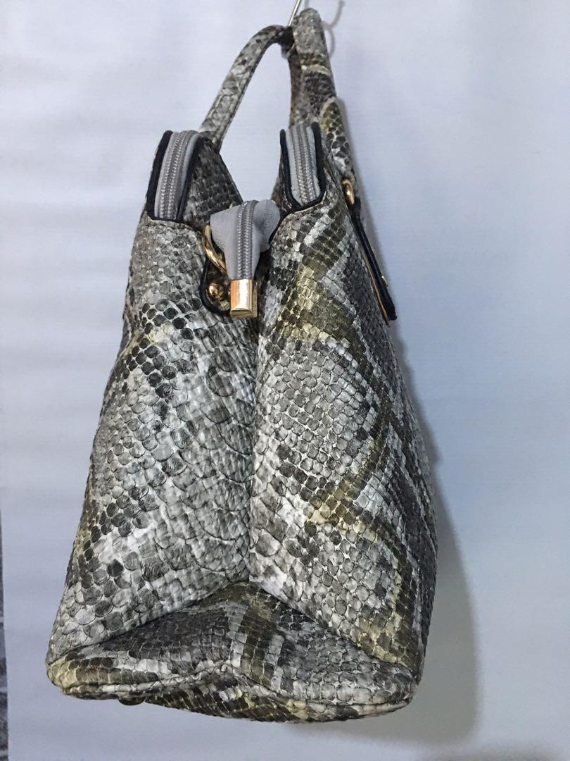 Elequator snake skin two way (Category: Shoulder Bags) located in Cainta. Submitted by janilen (Listing ID 1069824867, Image 3). Description: 10"x12" Authentic. No sling. No flaws See Pic for details .