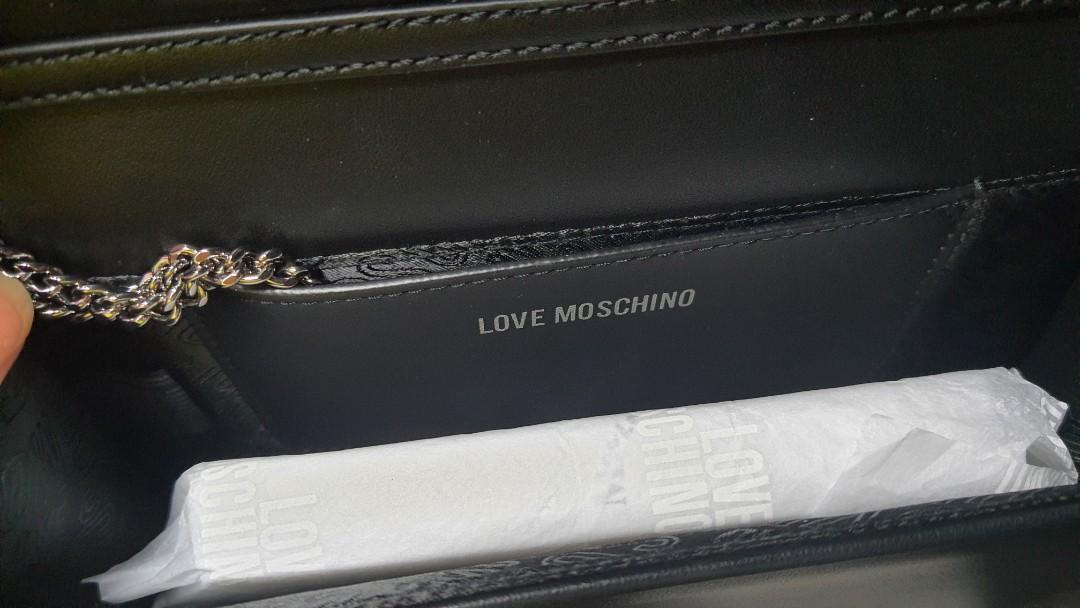 Love Moschino classic crossbody authentic (Category: Luxury Bags & Wallets) located in Subic. Submitted by saybyetofelicia (Listing ID 1069770786, Image 2). Description: love moschino with tag chain crossbody silver with dustbag can be used as clutch.