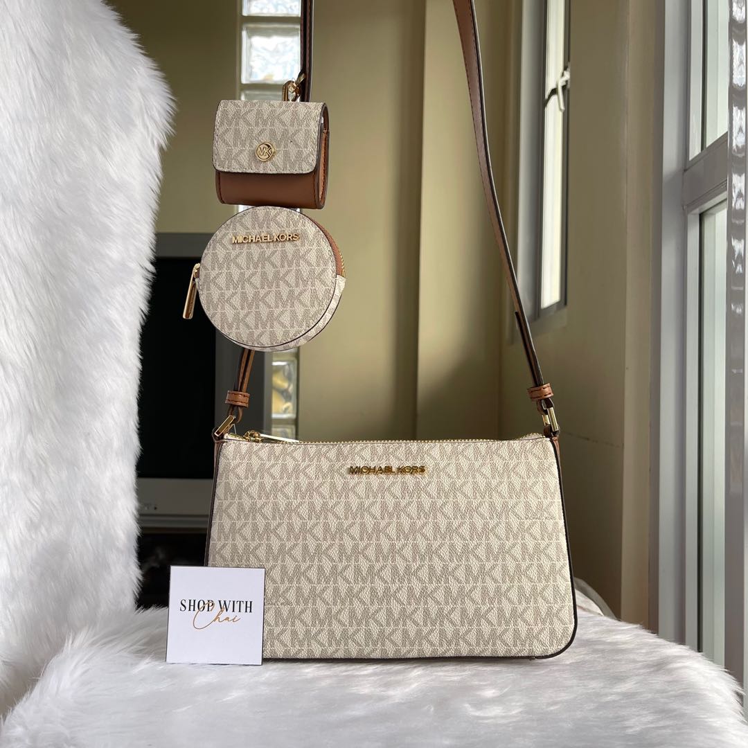 Michael Kors Multi-Pochette, Luxury, Bags & Wallets on Carousell