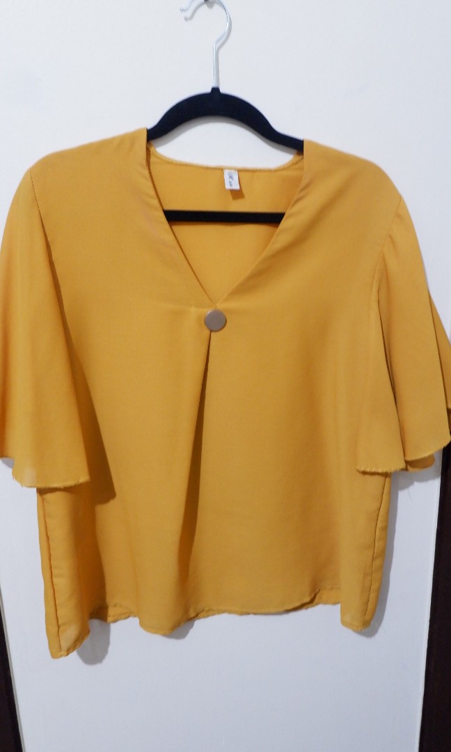 mustard coloured blouse