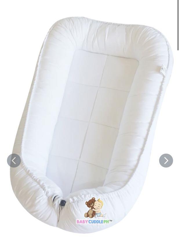 Baby cuddle - pure white (Category: Other Baby Bathing & Changing Needs) located in San Juan City. Submitted by protoolsmnl (Listing ID 1069965147, Image 1). Description: Well loved bought march 2019 used a few times only 6 Ways to Use a Babycuddle Bed In the baby crib as a bed insert In the couch (we highly recommended adult supervision whether the baby is awake or asleep.) In the bedroom For baby exercise (tummy time & playing) On trip and trav