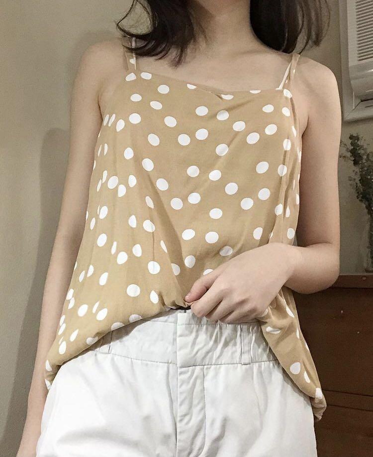 beige polka dot top