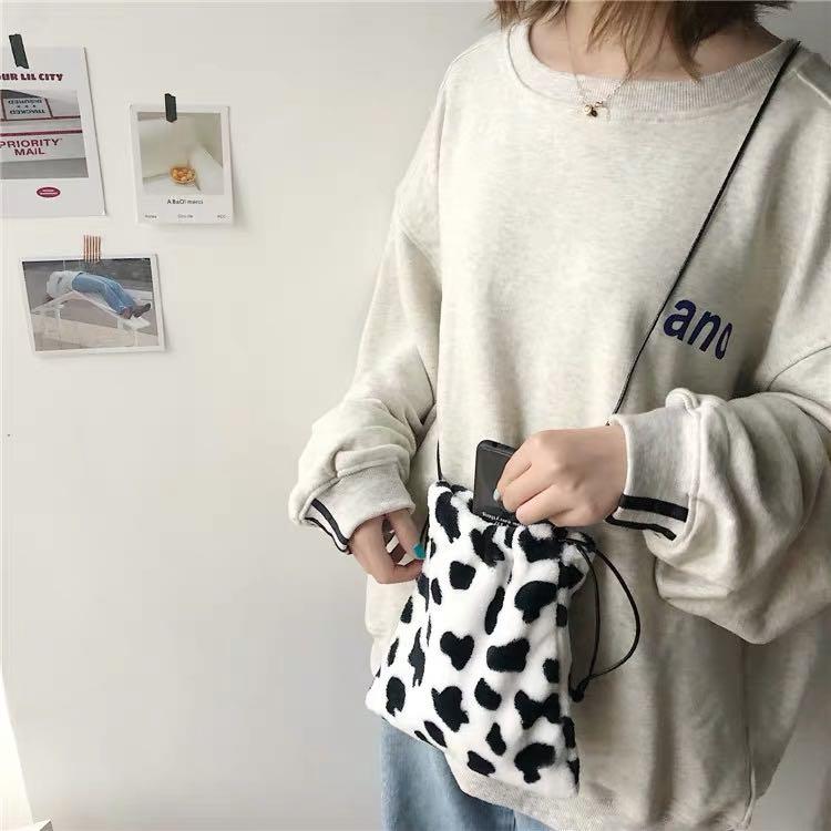 cow print sling bag, Women's Fashion, Bags & Wallets, Sling Bags on ...
