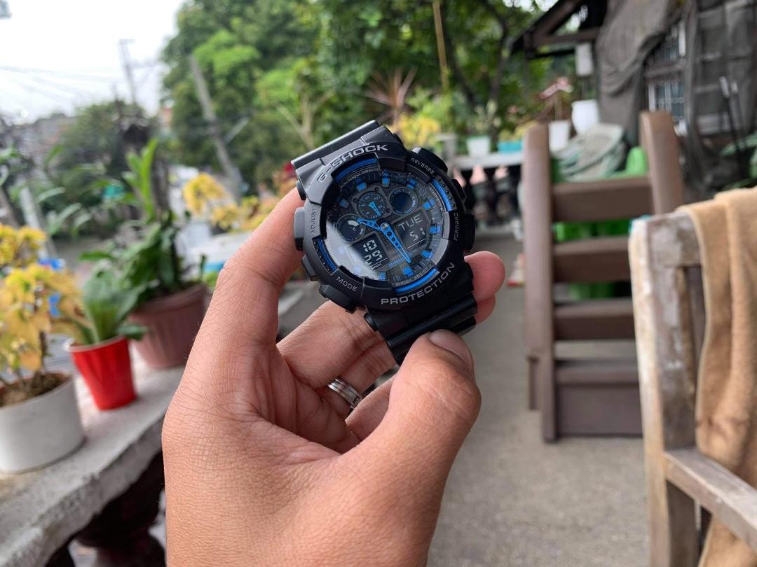 G shock ga 100 black discount blue