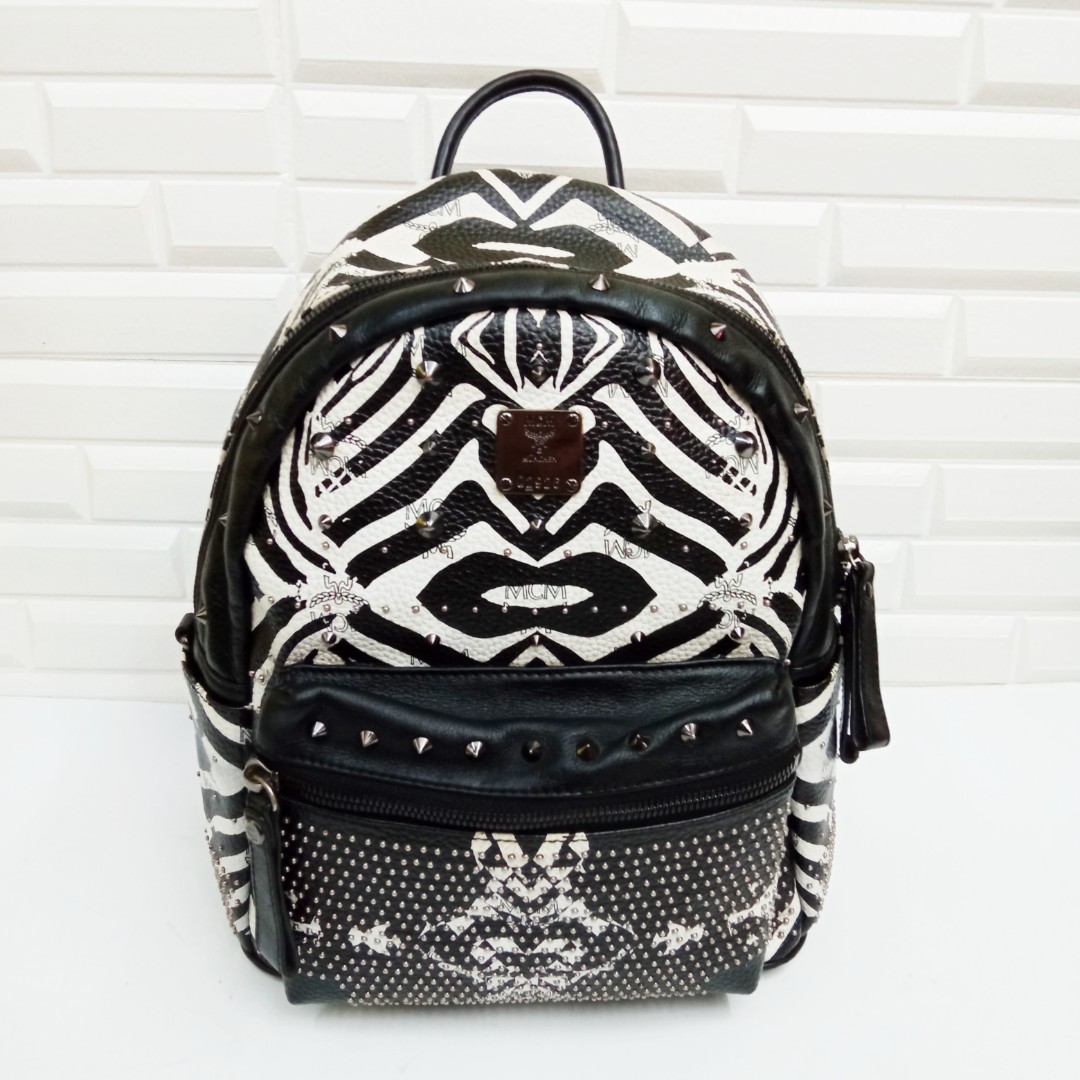 Mcm striped discount backpack