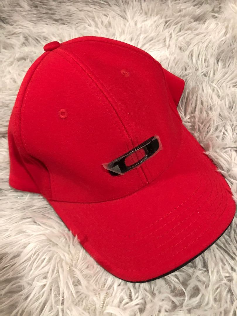 Red Oakley cap (original), Men's Fashion, Watches & Accessories, Caps & Hats  on Carousell