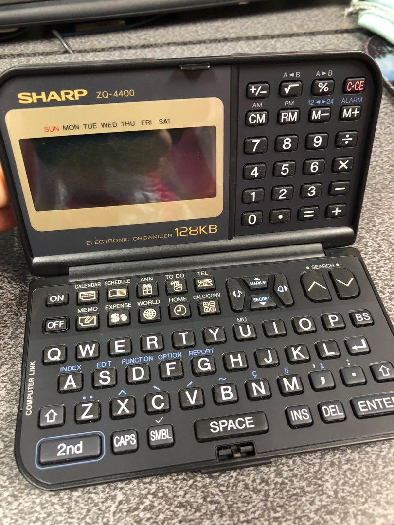 Sharp ZQ-4400 Electronic Planner Organizer Calculator Office (Category: Office & Business Technology) located in Manila. Submitted by number0101 (Listing ID 1070023899, Image 3). Description: If you are able to read this, that means the item is AVAILABLE Sharp ZQ-4400 Electronic Planner Organizer Calculator Office Issue: the LCD screen not useable and needs replacement (a common issue with gadgets this old due aging) Or the unit can be used as pa