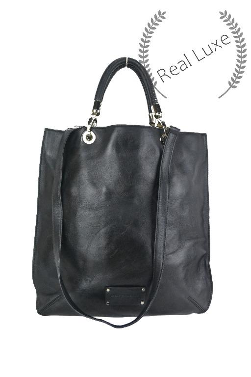 Authentic COCCINELLE black leather flat 2 way bag (Category: Luxury Bags & Wallets) located in Cagayan de Oro. Submitted by real_luxe (Listing ID 1070259656, Image 1). Description: Like New INCLUSION: None "PLEASE TAKE A CLOSER LOOK ON THE FLAWS" The Photos are taken by "US" and water mark on all images to avoid people taking our hard work. We take a lot of photos already with good quality, so hoping you wont ask for more as my time is very limit