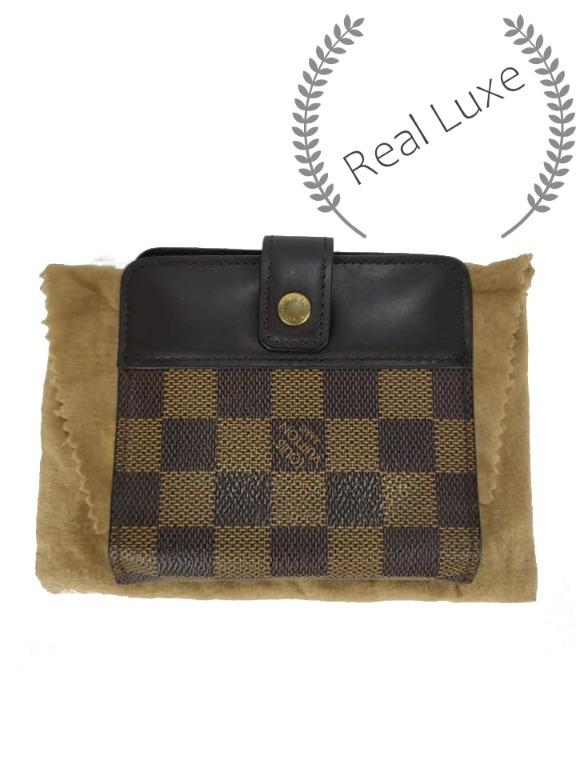 Authentic LOUIS VUITTON damier bifold compact wallet (Category: Luxury Bags & Wallets) located in Cagayan de Oro. Submitted by real_luxe (Listing ID 1070252634, Image 3). Description: Flaw: Minor tear With Dustbag "PLEASE TAKE A CLOSER LOOK ON THE FLAWS" The Photos are taken by "US" and water mark on all images to avoid people taking our hard work. We take a lot of photos already with good quality, so hoping you wont ask for more as my time is ve