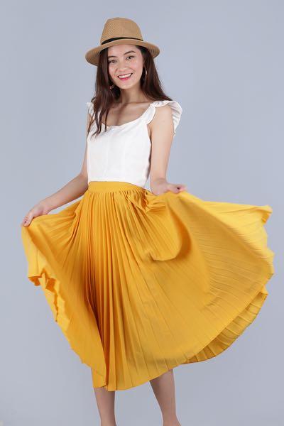 Golden yellow high waist midi skirt, Women's Fashion, Bottoms, Skirts on  Carousell