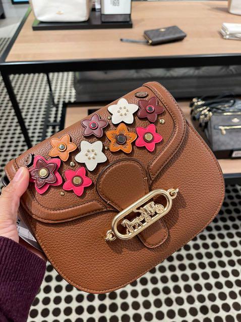 Jade shoulder bag with daisy applique deals
