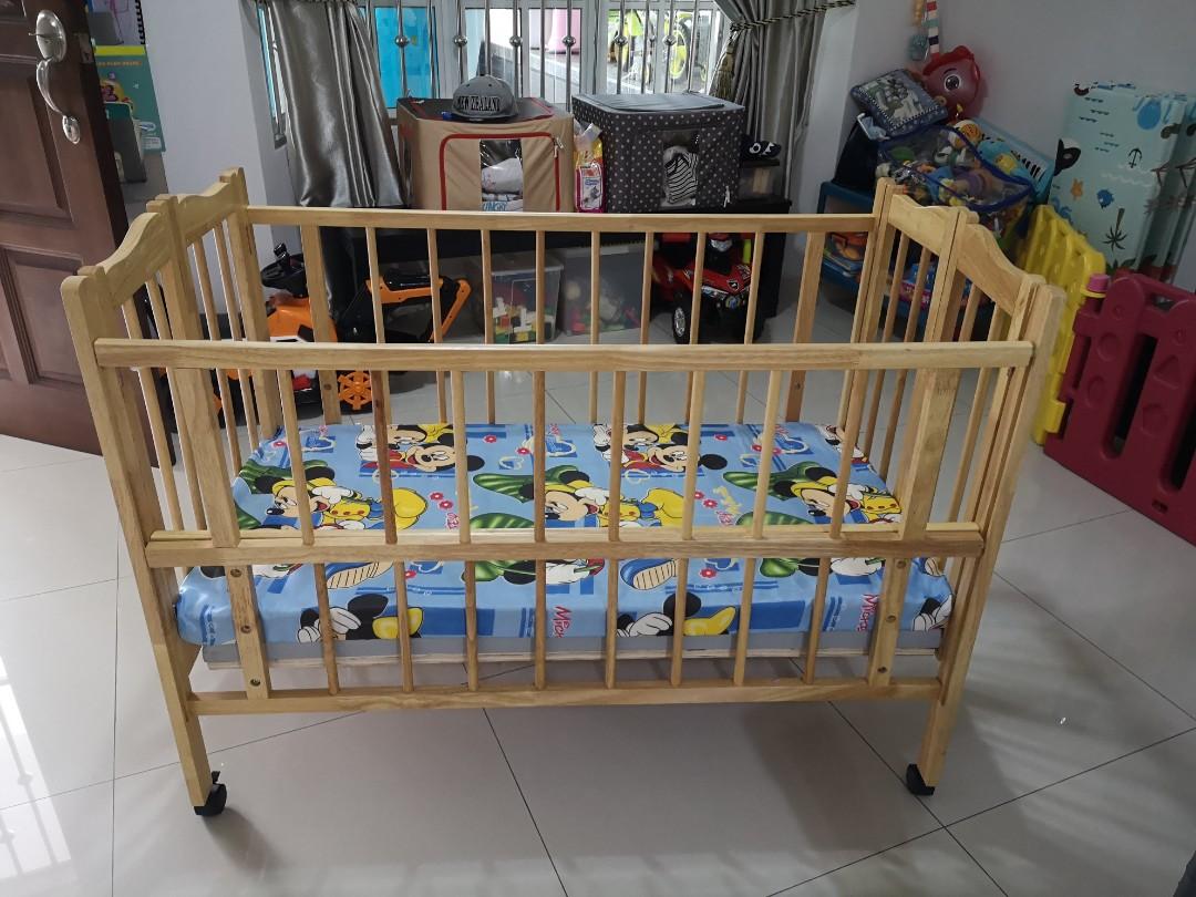 Foldable Wooden baby cot with mattress and roller Babies Kids