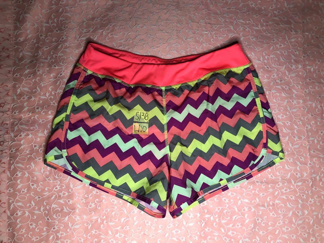 Nike sports attire (Category: Activewear) located in Valenzuela. Submitted by viangraf (Listing ID 1070326587, Image 1). Description: Top: Small Shorts with built in underwear : size 38 (garterized waist band) Length 10inch You can ask me for more details! :) Can do meet ups & shipping!.