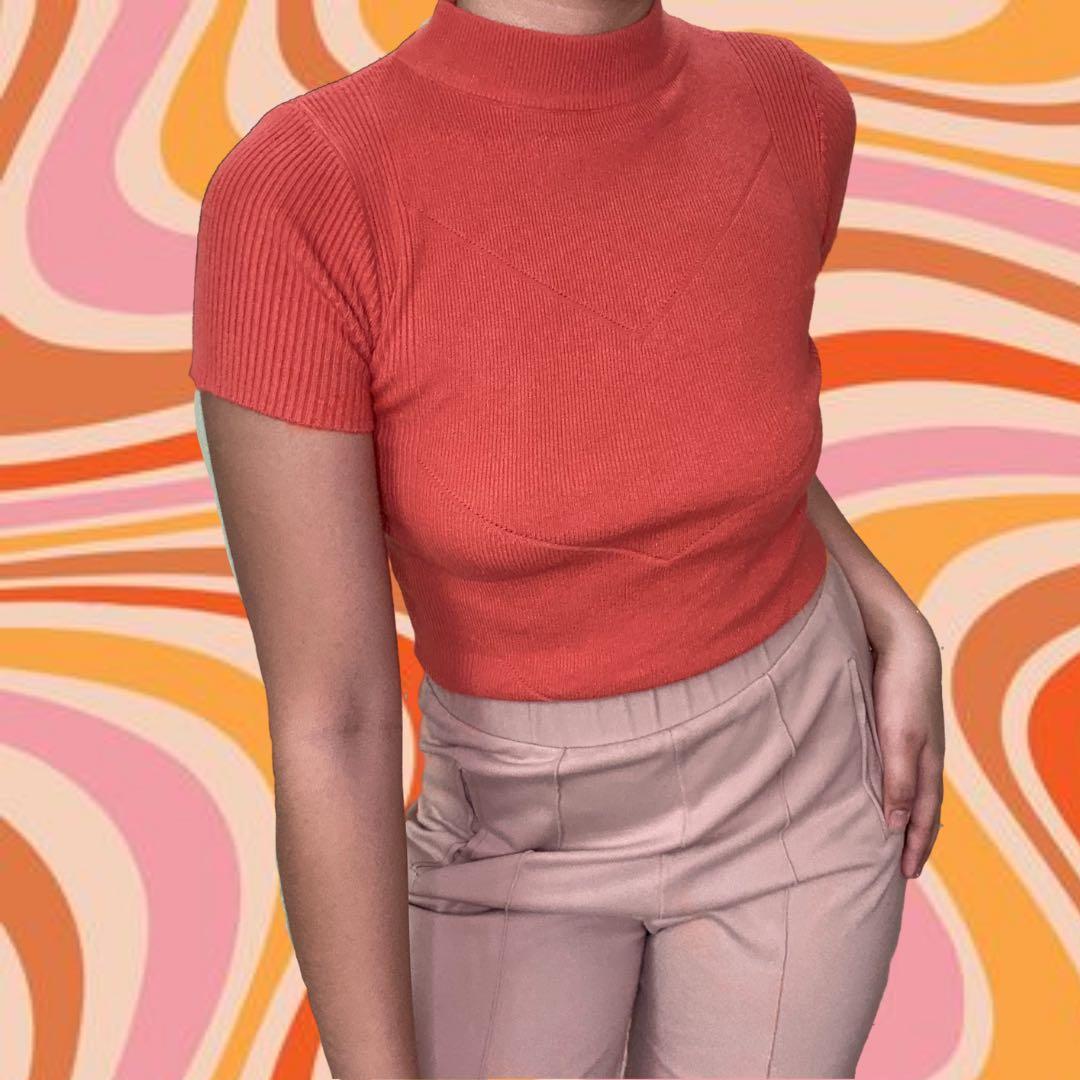 orange mock neck top