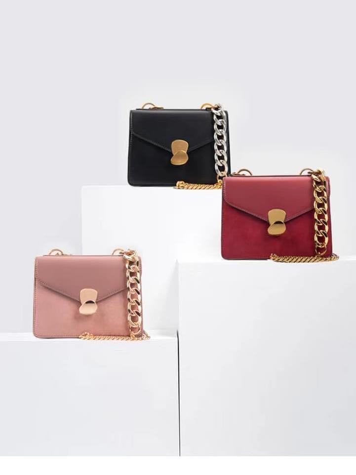 Metal detail front best sale flap bag