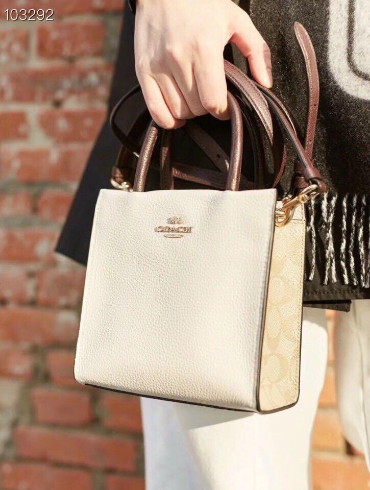 Mini cally crossbody in signature canvas on sale