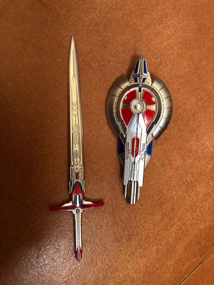 Optimus prime sword and shield toy top