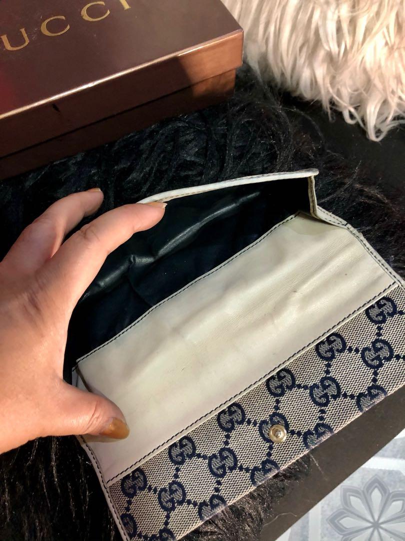 Authentic Gucci Wallet (Category: Luxury Bags & Wallets) located in Pasig City. Submitted by rtisaguirre (Listing ID 1070663399, Image 3). Description: Authentic Gucci Vintage wallet It was owned by Angel Locsin before and i brought it from a benefit auction Signs of usage Complete with box It is a lucky wallet Payment via Gcash and BDO.