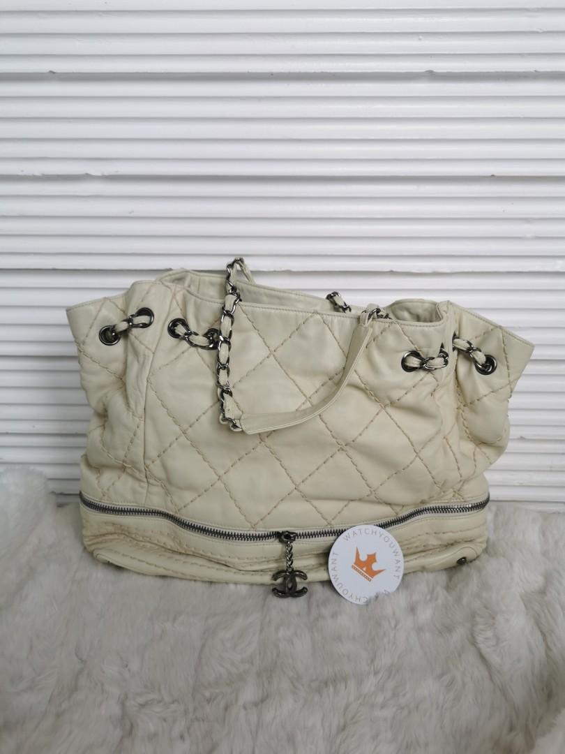Authentic Preowned CHANEL Beige Wild Stitch Expandable Drawstring Chain Tote Bag (Category: Luxury Bags & Wallets) located in San Pablo. Submitted by watchyouwantphsecond (Listing ID 1070608782, Image 3). Description: Authentic Preowned C H A N E L Beige Wild Stitch Expandable Drawstring Chain Tote Bag No Inclusion Interior 8.9/10 Exterior 8.9/10 Strap 8.9/10 Hardware 8.9/10 P50,000 FREE SHIPPING Open For Layaway Credit Card Accepted Cash On Deli