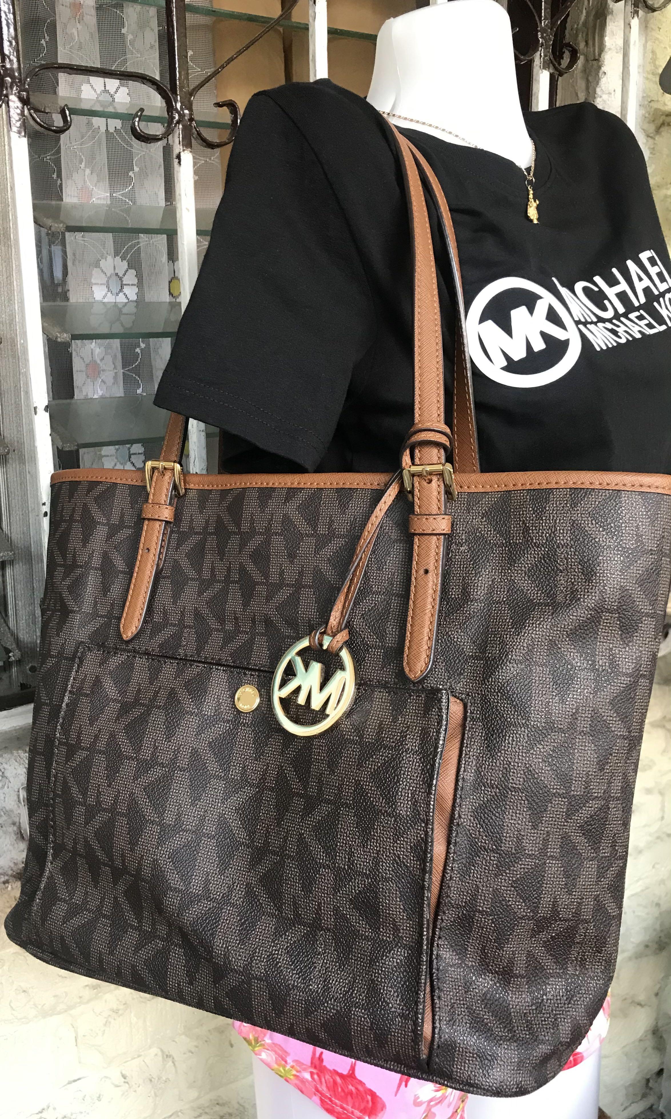 Michael Kors Jet Set Medium Snap Pocket Tote Monogram Authentic, Luxury,  Bags & Wallets on Carousell