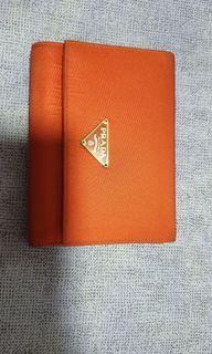 Prada red nylon and leather trifold wallet