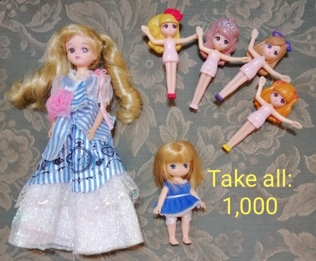 Tomy Licca dolls from Japan (Category: Kids Toys) located in Quezon City. Submitted by corgi1231 (Listing ID 1070534443, Image 1). Description: Repriced! Take all for ₱900 Individual prices: Licca plastic dolls ₱150 Small doll with bangs ₱150 Licca in blue dress ₱900 Licca in blue Alice in Wonderland dress: head is lighter colored than rest of body Hair of both dolls are brushable and recently cleaned Very cute faces Location Fairview QC.