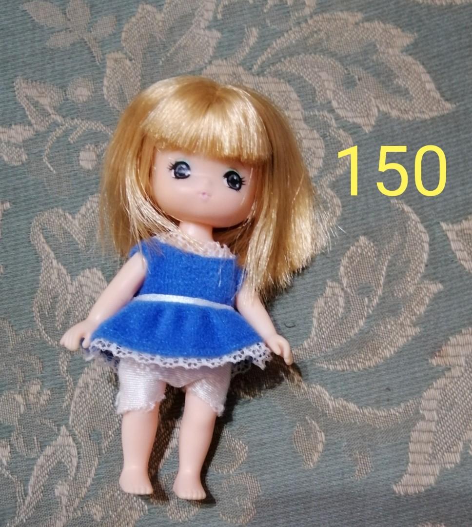 Tomy Licca dolls from Japan (Category: Kids Toys) located in Quezon City. Submitted by corgi1231 (Listing ID 1070534443, Image 3). Description: Repriced! Take all for ₱900 Individual prices: Licca plastic dolls ₱150 Small doll with bangs ₱150 Licca in blue dress ₱900 Licca in blue Alice in Wonderland dress: head is lighter colored than rest of body Hair of both dolls are brushable and recently cleaned Very cute faces Location Fairview QC.