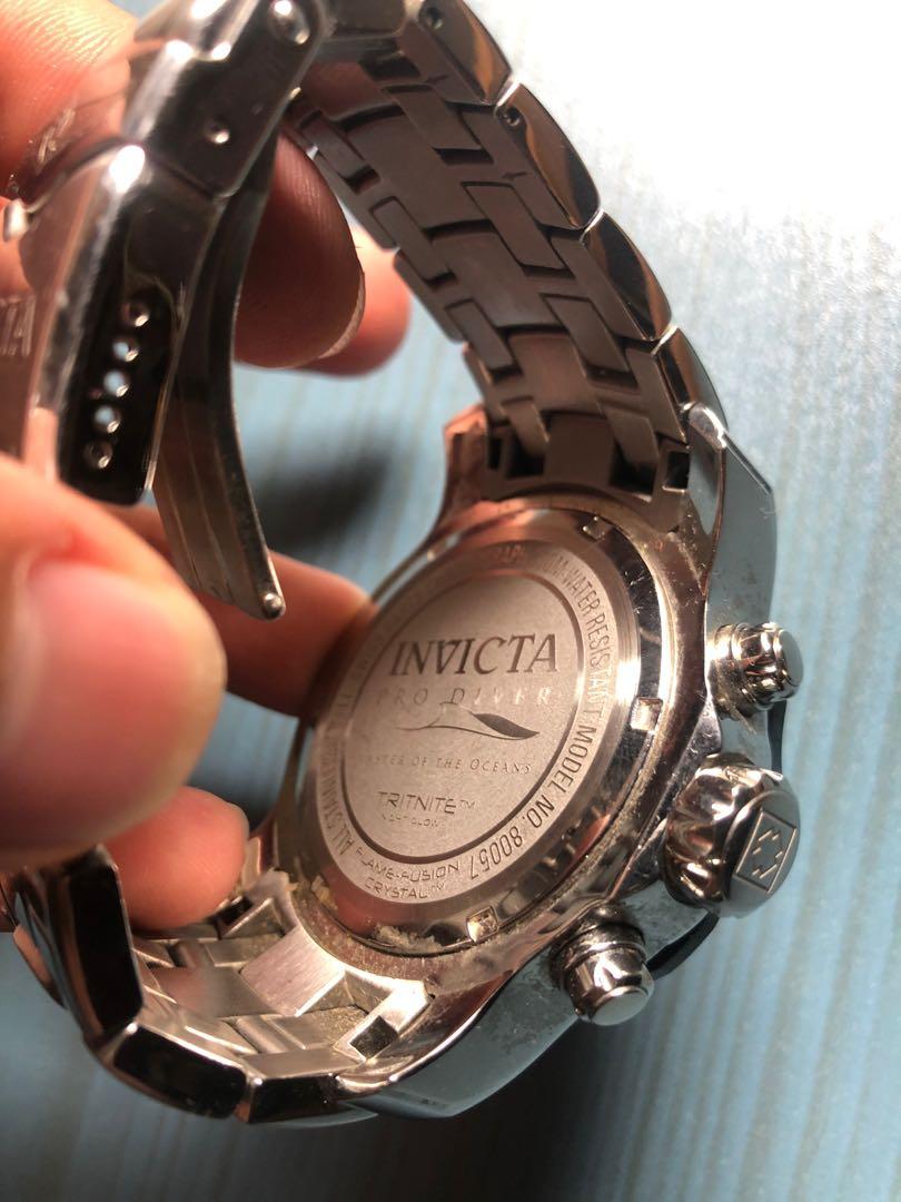 Invicta pro diver master of the best sale oceans tritnite night glow flame fusion crystal