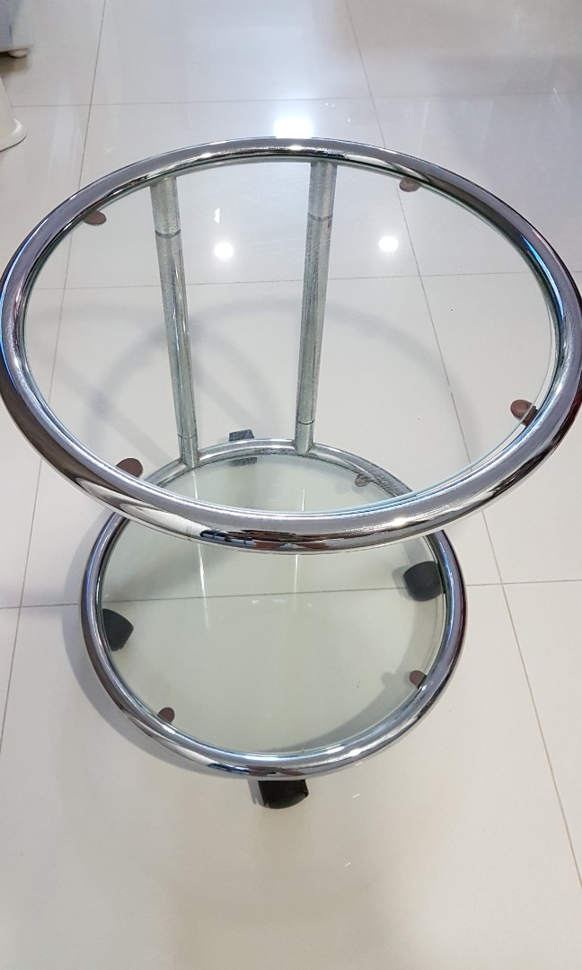 Round glass coffee table on rollers, Furniture & Home Living, Furniture