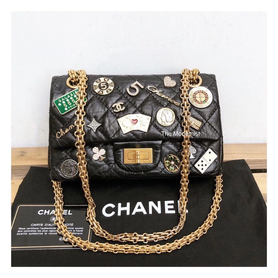 Authentic Chanel Mini 224 2.55 Reissue Lucky Charms Casino Collection Black  Aged Calf Gold Hardware, Luxury, Bags & Wallets on Carousell