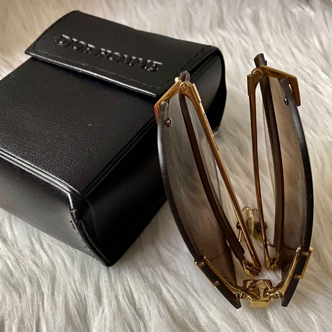 Dior Foldable Sunglasses (Category: Luxury Accessories) located in Pasig City. Submitted by thecruzescloset (Listing ID 1071030424, Image 1). Description: Dior Homme Foldable Sunglasses Condition: Like New - barely used. Inclusions: Sunglasses case Selling for only ₱12800 + shipping fee. ▪️Bank Deposit Paypal PayMaya GCash ▪️No Trades / No Haggling ▪️No returns / refund / exchange once sold ▪️Shipping Fee c/o Buyer ▪️ Decluttering. Needs space in