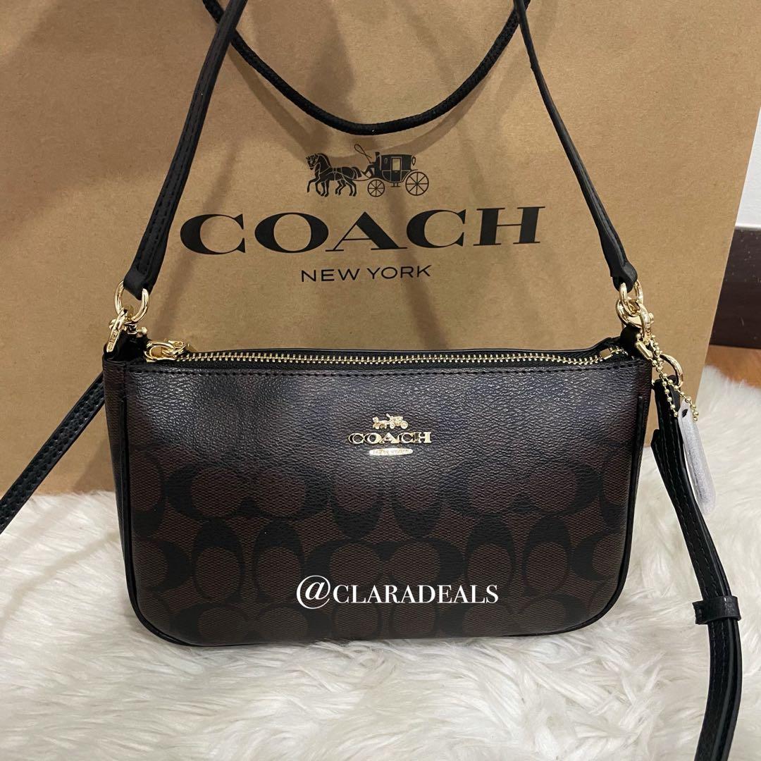 Top handle pouch outlet in signature canvas