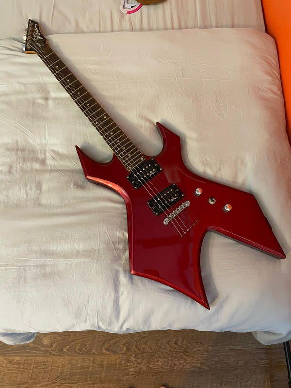 B.C. Rich Bronze Warlock Electric Red, Hobbies & Toys, Music & Media, Musical Instruments on Carousell