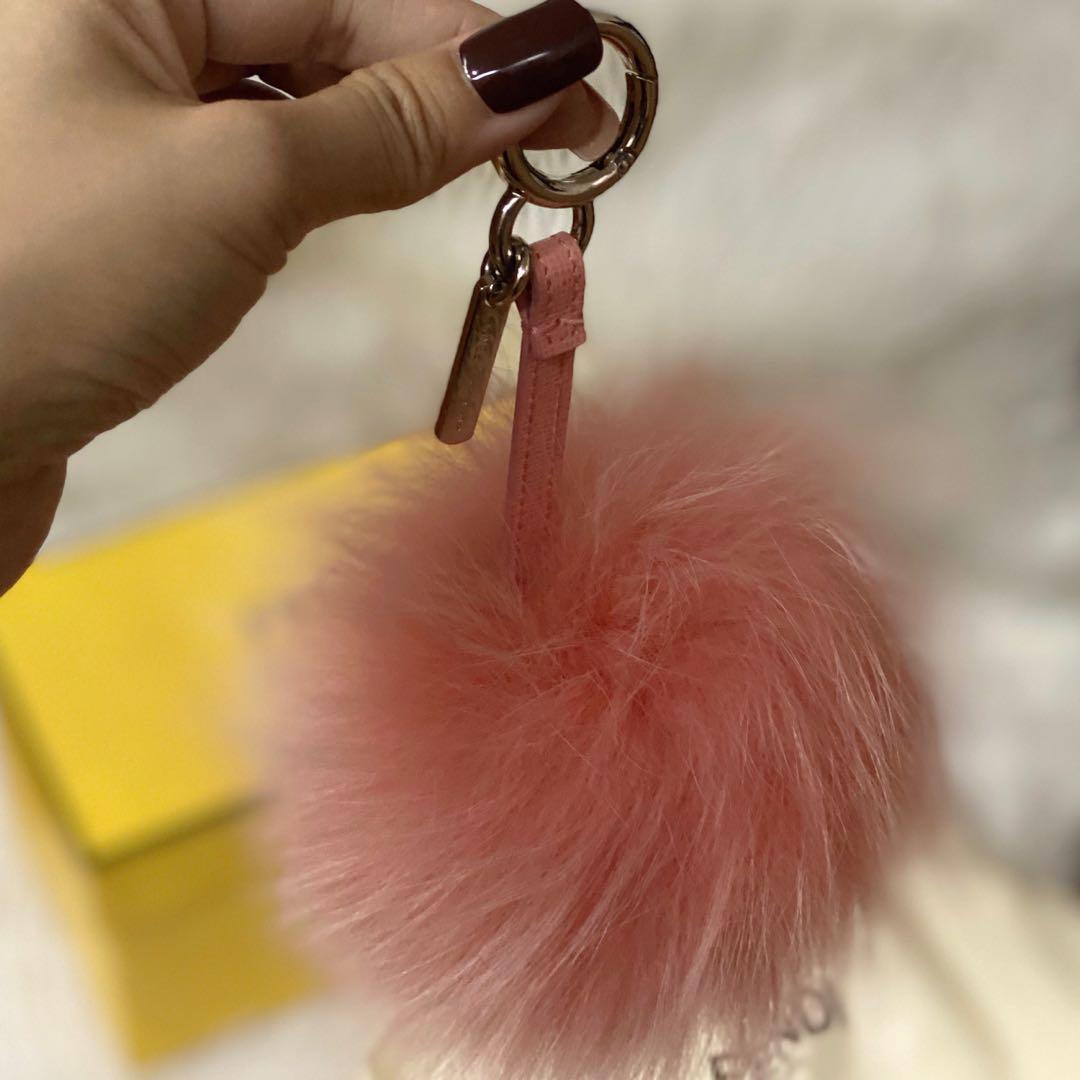 Fendi Pom Pom Bag Charm (Category: Luxury Accessories) located in Pasig City. Submitted by thecruzescloset (Listing ID 1071190786, Image 3). Description: Fendi Pom Pom Bag Charm Peach Dyed Shadow Fox Fur. Polished silvertone logo charm. Peach colored lamb leather charm strap. Polished silvertone key-ring clip. 9” total length, 3” strap drop (approximately) Condition: Excellent - barely used. Good as new. Inclusions: Dust bag and Box Bought in Par