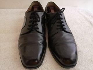 Salvatore Ferragamo cap toe Derby shoes.