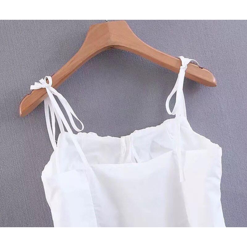 white color sleeveless spaghetti strap crop top (Category: Sleeveless) located in Cebu City. Submitted by lavitify (Listing ID 1071253940, Image 2). Description: Brand new and onhand stocks Model is wearing size Small Model dimension: 42.8kg / 5ft / 25in waist Available sizes: S, M, L Refer to last photo for size chart ~ formal looking spaghetti top ~ great for people with bust as its little ruched ~ very nice material.