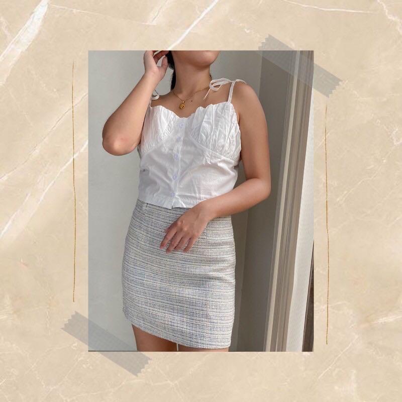 white color sleeveless spaghetti strap crop top (Category: Sleeveless) located in Cebu City. Submitted by lavitify (Listing ID 1071253940, Image 3). Description: Brand new and onhand stocks Model is wearing size Small Model dimension: 42.8kg / 5ft / 25in waist Available sizes: S, M, L Refer to last photo for size chart ~ formal looking spaghetti top ~ great for people with bust as its little ruched ~ very nice material.