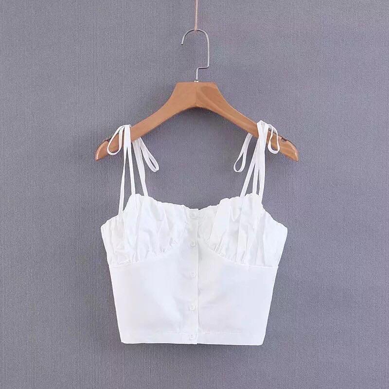 white color sleeveless spaghetti strap crop top (Category: Sleeveless) located in Cebu City. Submitted by lavitify (Listing ID 1071253940, Image 1). Description: Brand new and onhand stocks Model is wearing size Small Model dimension: 42.8kg / 5ft / 25in waist Available sizes: S, M, L Refer to last photo for size chart ~ formal looking spaghetti top ~ great for people with bust as its little ruched ~ very nice material.