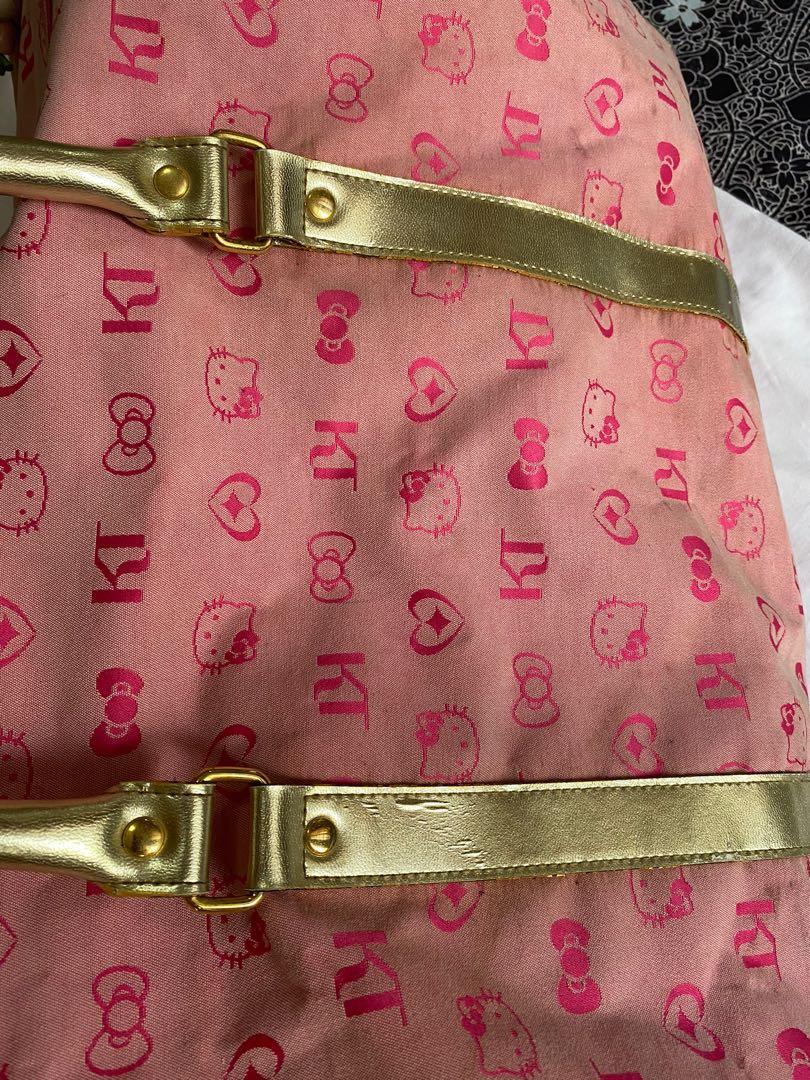 💯 Authentic Sanrio Hello Kitty Duffle bag with strap (Category: Cross-body Bags) located in Quezon City. Submitted by irenerc (Listing ID 1071382144, Image 3). Description: 💯 Authentic. Please see photos for flaws. Needs minor cleaning. Overall the bag is sturdy and trendy. Color is pink and gold accent and strap. Rfs decluttering .