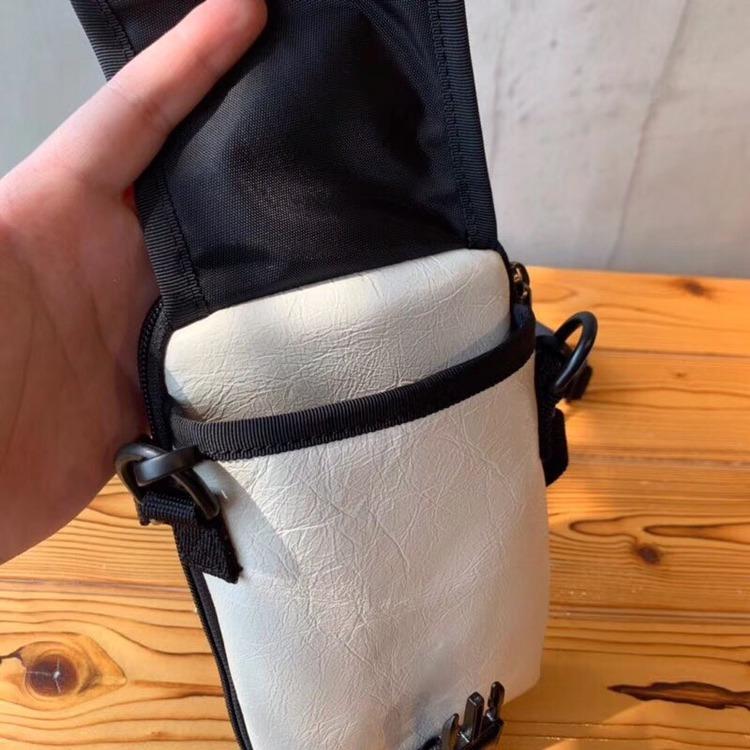 Explorer crossbody pouch bag
