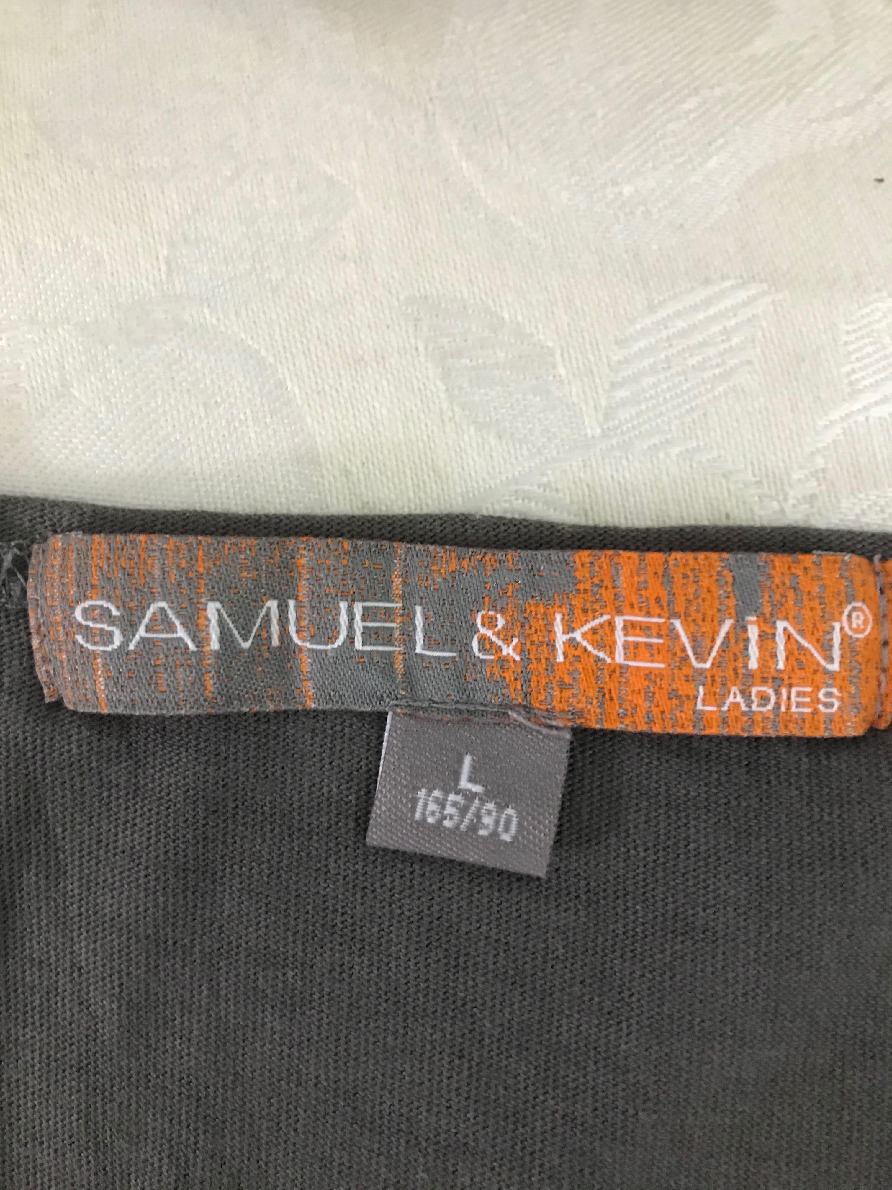 Gray sleeveless (Category: Dresses) located in Famy. Submitted by echolima21 (Listing ID 1071363042, Image 2). Description: Samuel & Kevin Large Gray sleeveless Pwede sha lagyan ng inner shirt Let me know if you need to see measurements.