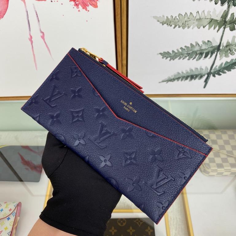 Louis Vuitton Pochette Melanie BB Marine Rouge, Women's Fashion, Bags &  Wallets, Purses & Pouches on Carousell