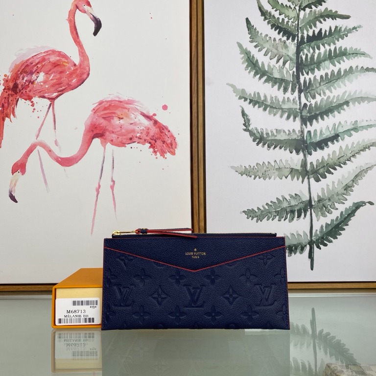 Louis Vuitton Pochette Melanie BB Marine Rouge, Women's Fashion, Bags &  Wallets, Purses & Pouches on Carousell