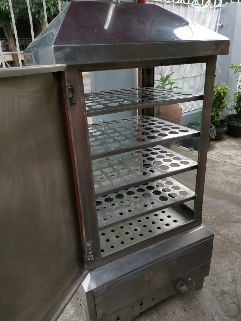 Siopao/ Siomai Steamer (Category: Food Organization & Storage) located in Quezon City. Submitted by ailynnann (Listing ID 1071339921, Image 3). Description: Gas (LPG) Steamer 4 layers Stainless steel body AS IS, WHERE IS Issues: -stuck up knob -need to install handle for water tank Pm for inquiries. Thank you.