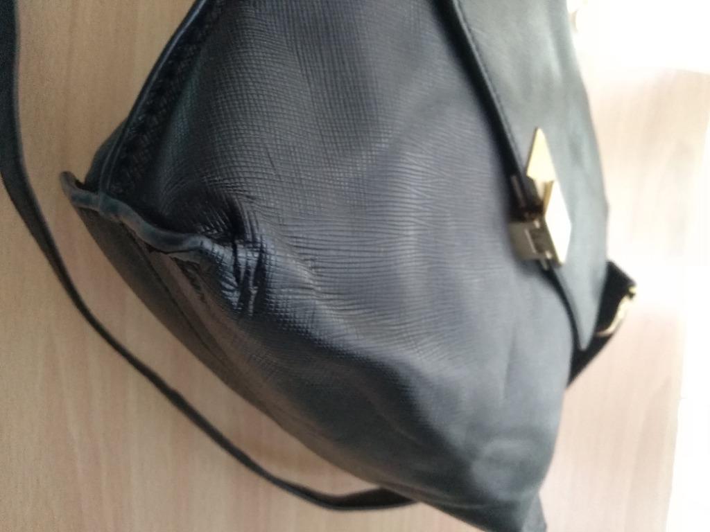 CHARLES AND KEITH Sling Bag (Category: Cross-body Bags) located in Pasig City. Submitted by miacon (Listing ID 1071601614, Image 3). Description: With faded gold hardwares and dents Deformed due to storage Project bag, needs fixing Video is provided on my Instagram account Ig: @cctotes.etc DM me here for faster transaction for FREE if bundled with any items in my listing!.
