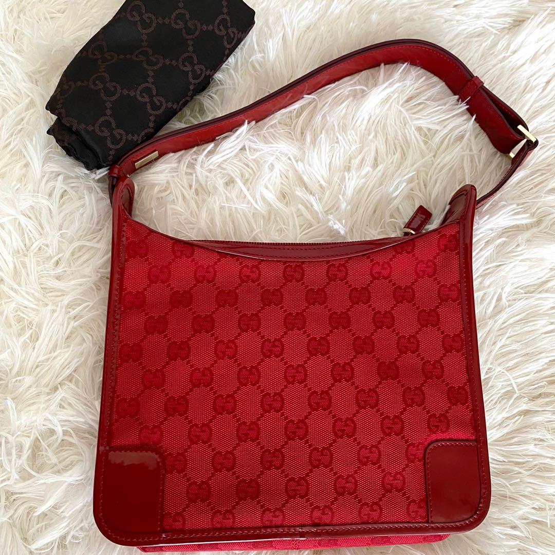 Gucci red monogram bag sale
